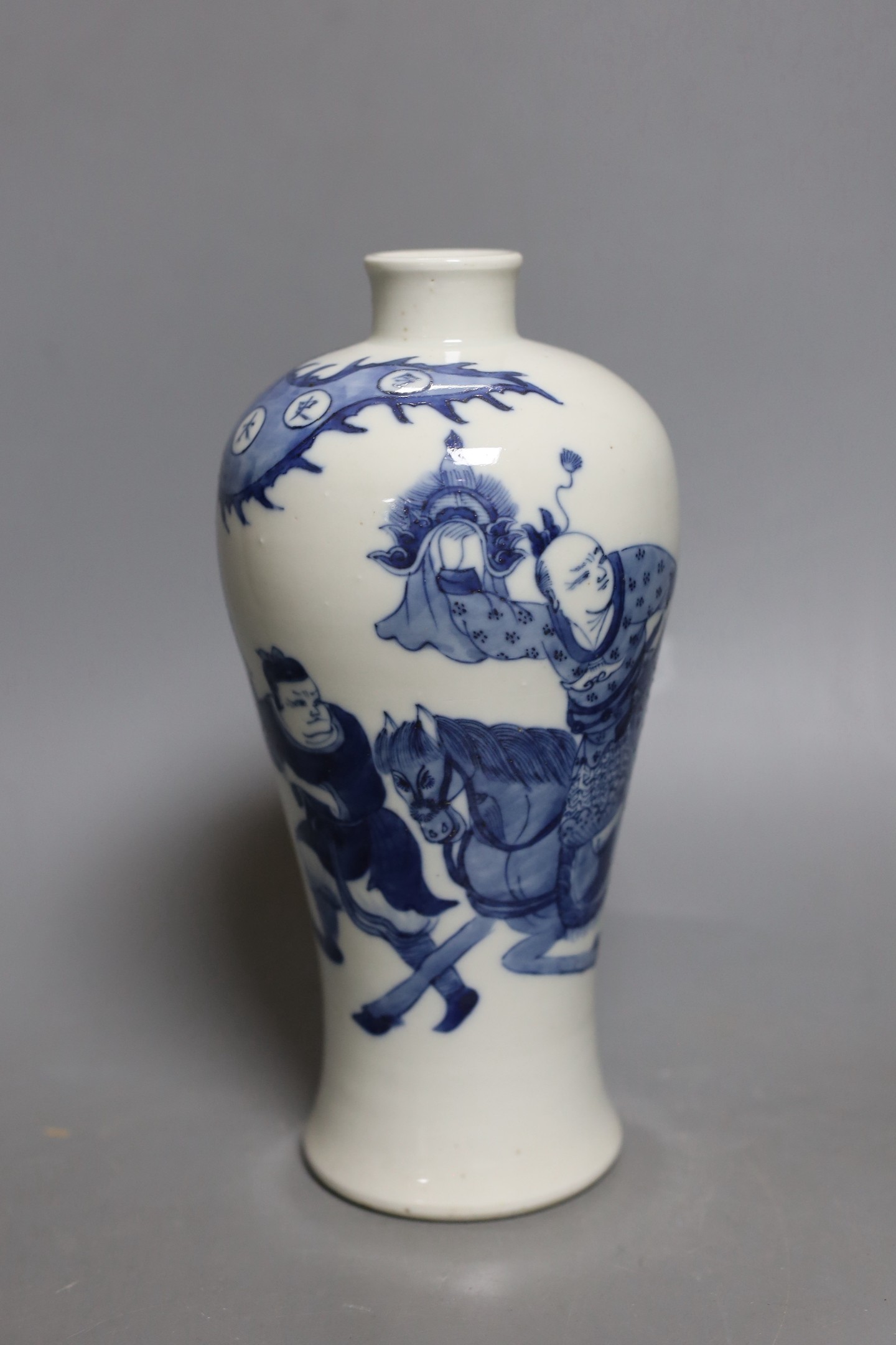 A Chinese blue and white baluster ‘warrior’ vase. 22cm tall